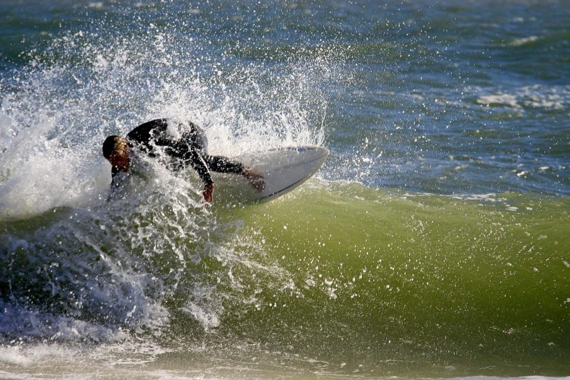 Surfer at the Outer Banks of North Carolina