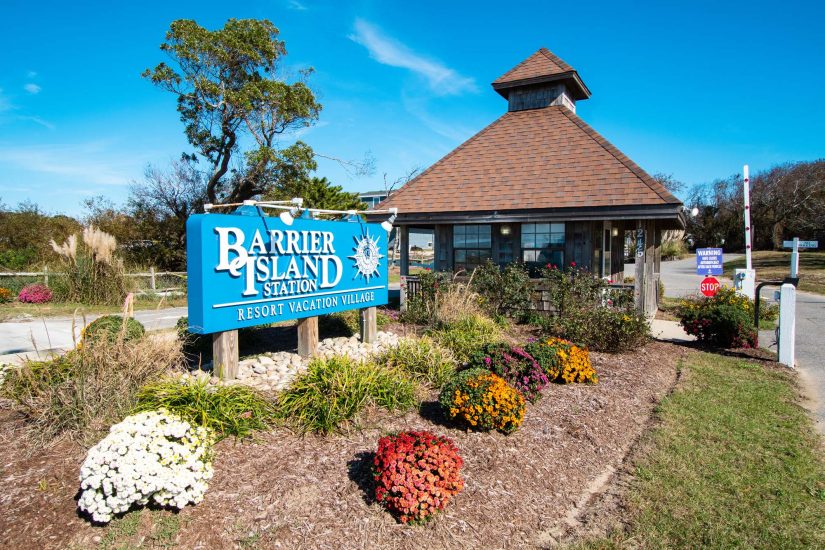 Photo of Resort entrance with Barrier Island Station Signage and small security checkpoint.